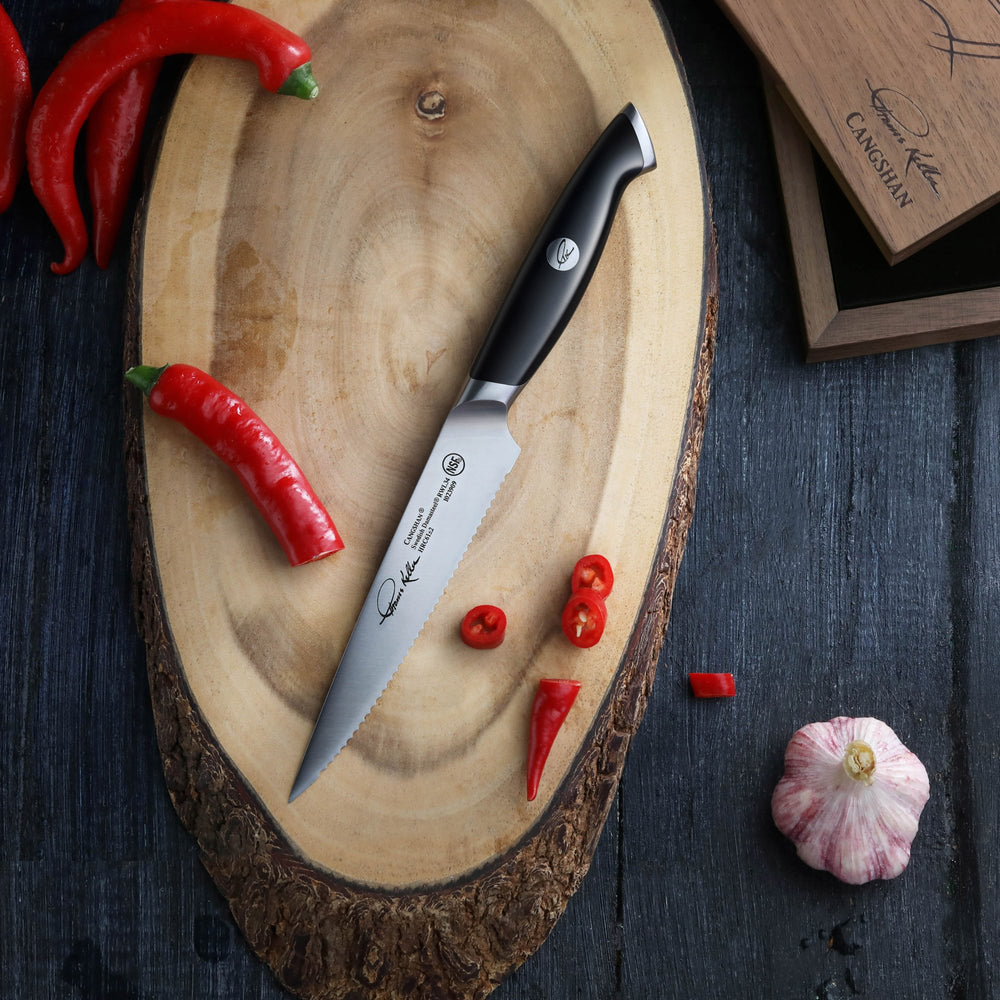 
                  
                    Load image into Gallery viewer, Cangshan Thomas Keller Signature Collection 5-inch Serrated Utility Knife, Forged Swedish Powder Steel
                  
                