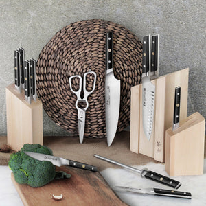
                  
                    Load image into Gallery viewer, Set of knives in wooden blocks with a cutting board and broccoli on a gray surface.
                  
                